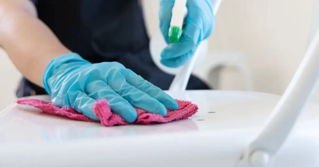 Wearing gloves while cleaning - USAMED Medical Distributors